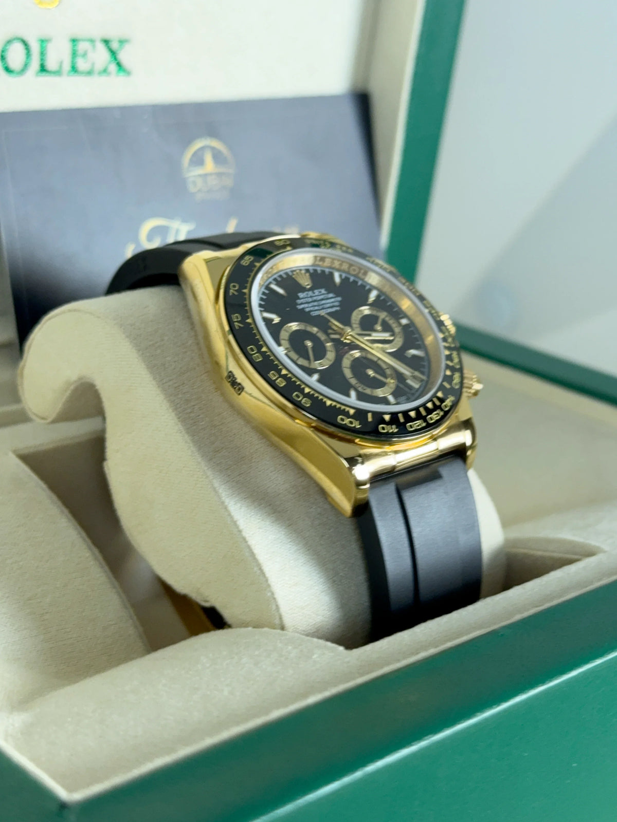 Rolex Daytona 40mm Yellow Gold Black Dial Black Ceramic Bezel Oysterflex Strap